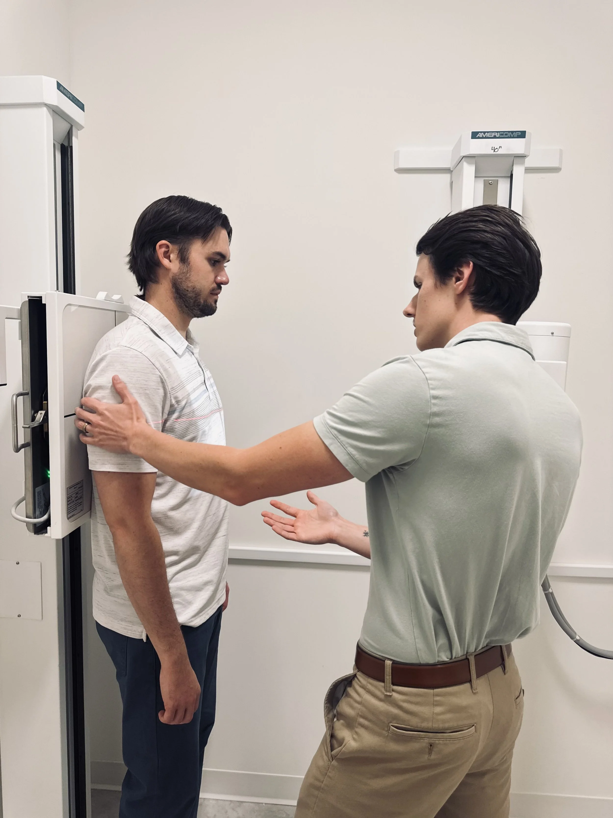 Dr. Brayden Hay reviewing digital X-rays with a practice member in Woodward, Oklahoma