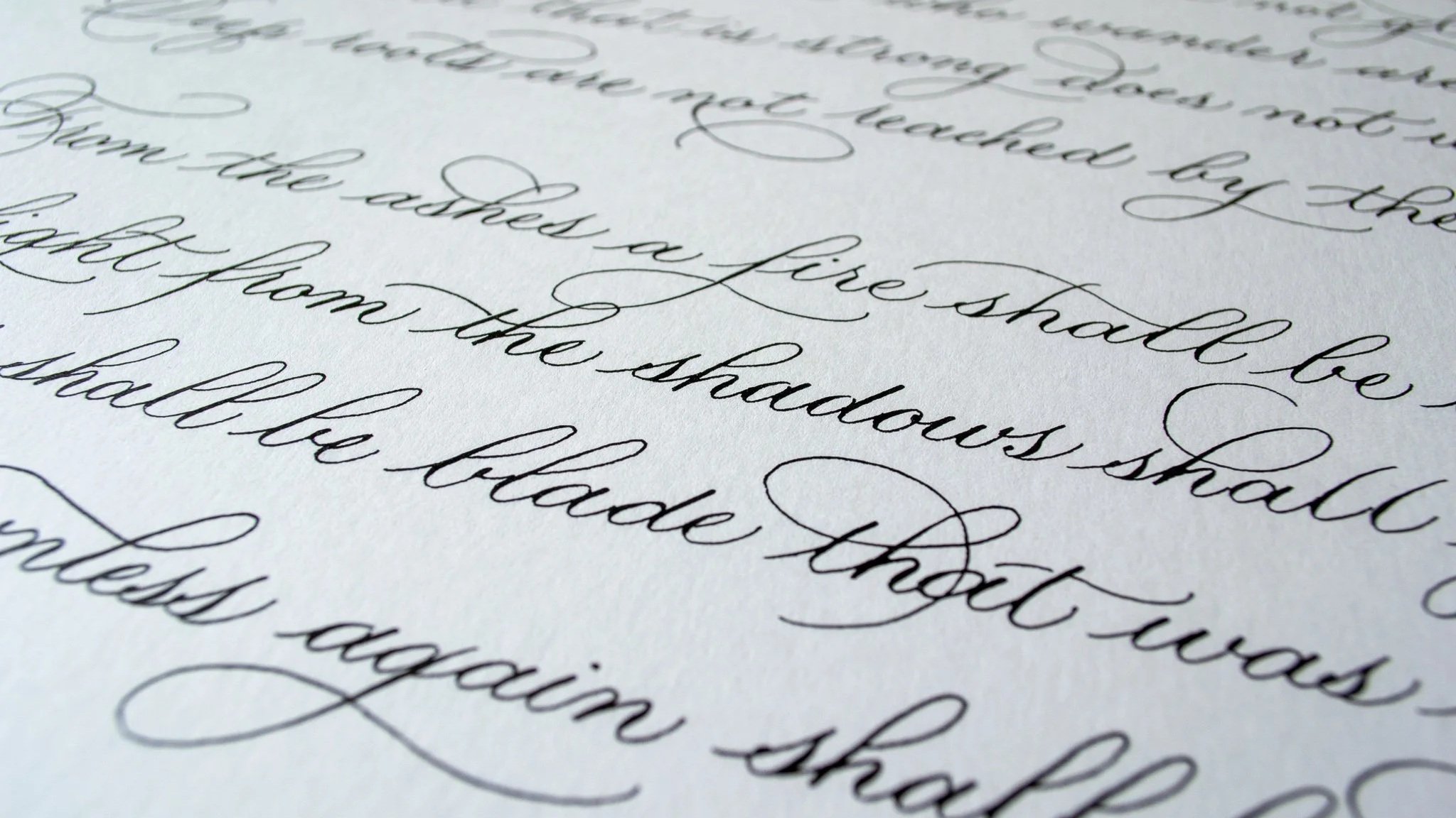 Close-up of handwritten cursive text on paper, with some words like 'Thank you' and 'appreciate' visible.