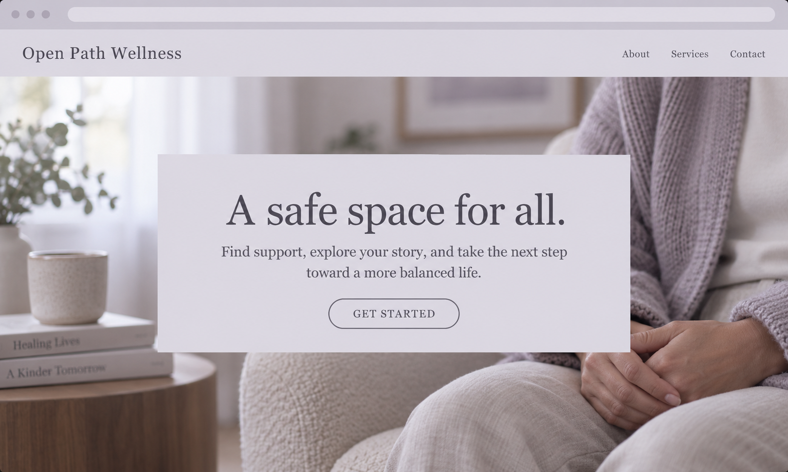 Homepage of Open Path Wellness website featuring a cozy, neutral-toned room with a stack of books and a white mug on a wooden table, and a woman sitting comfortably with her hands in her lap, as well as a large central text box with the message "A safe space for all" and a "Get Started" button.