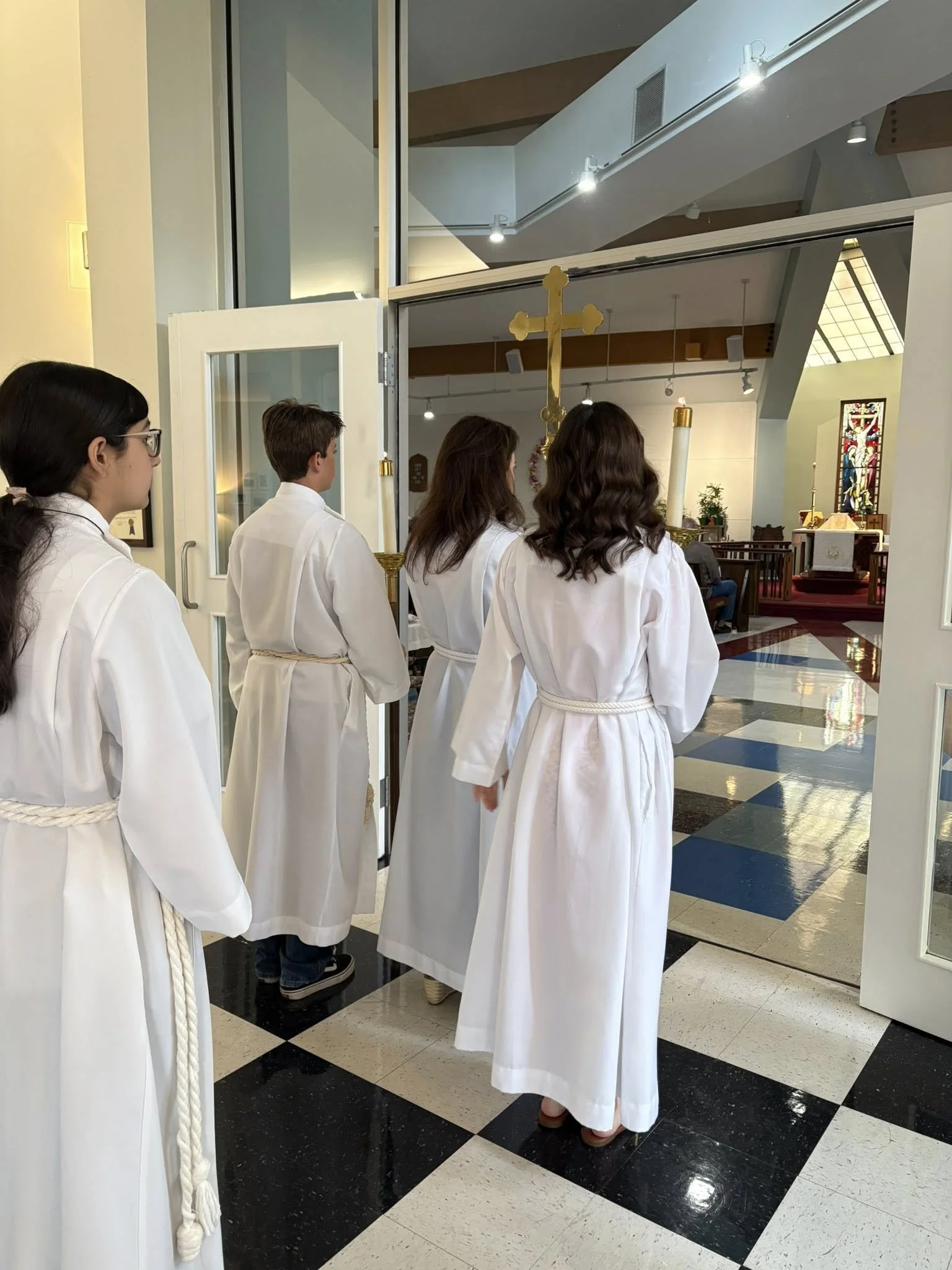 Photo of acolytes walking into worship