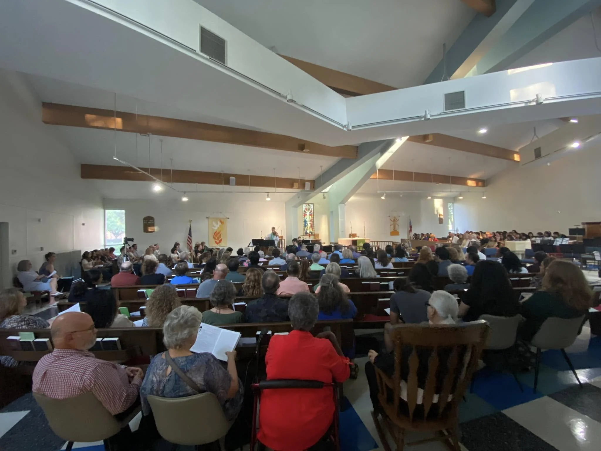 Photo of the Nave of St Mary's filled with worshippers.