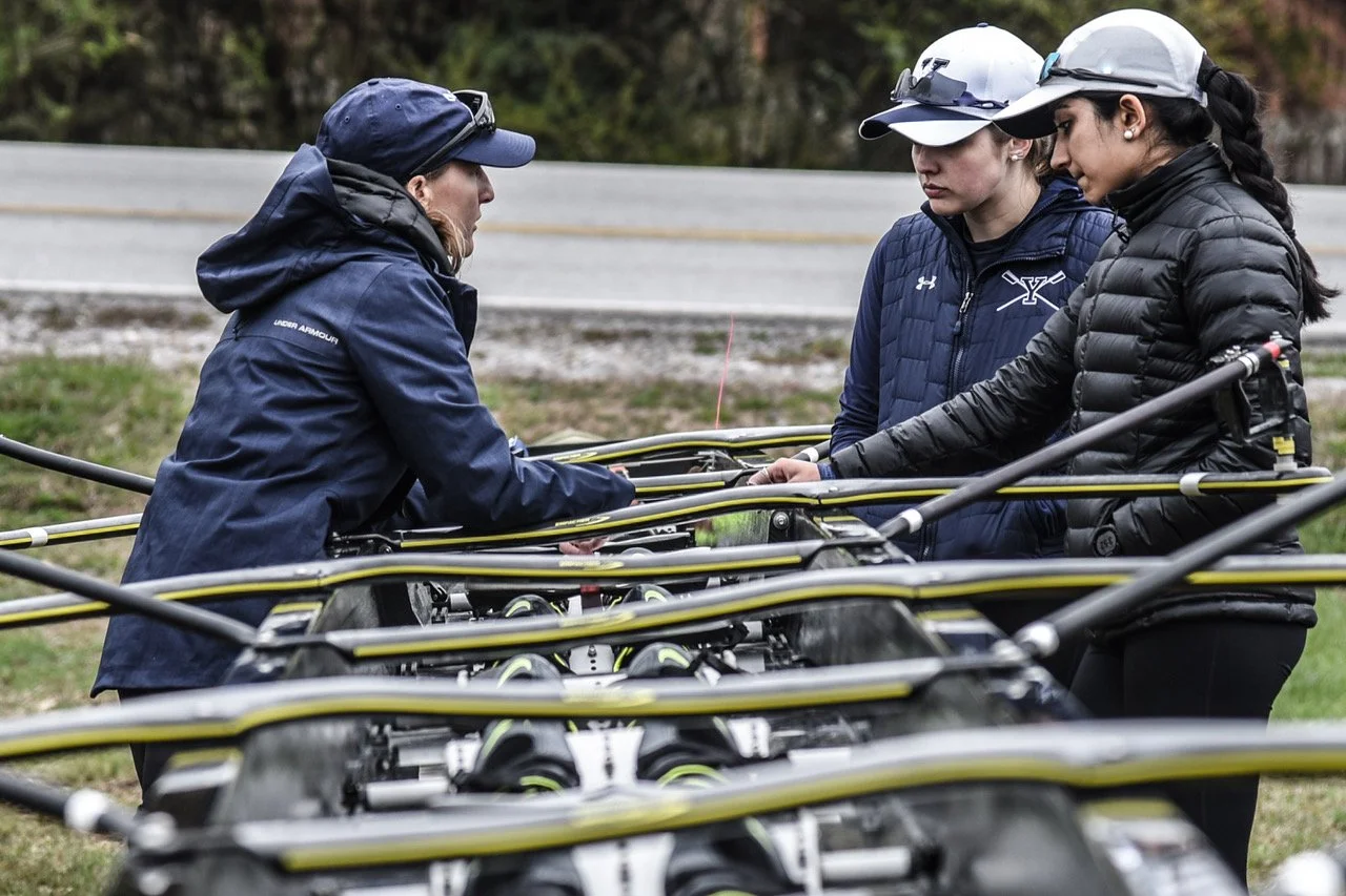 Yale women's rowing coach, Laura Simon, talking with V8+ and 2V8+ coxswains, Hannah Malzhan & Aparajita Chauhan, in Tennessee before major rowing race.