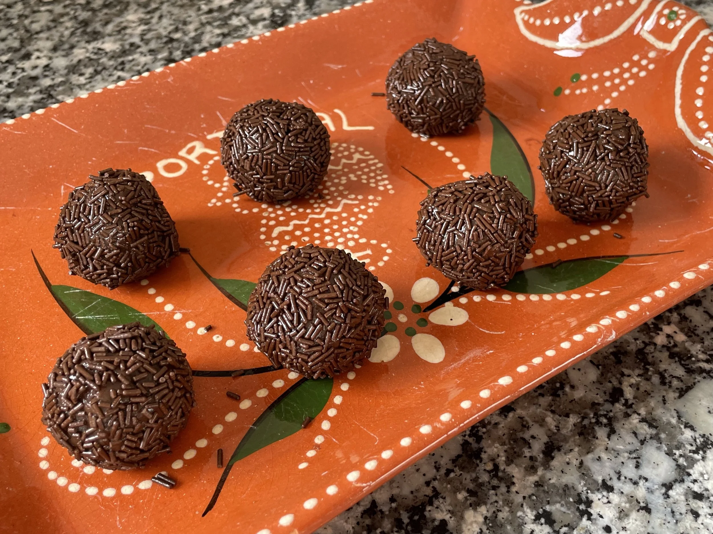 Chocolate balls covered in sprinkles