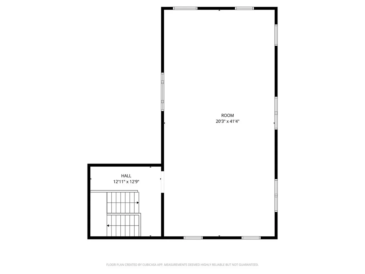 Floor plan showing a large room measuring 20 feet 3 inches by 41 feet 4 inches and a hall measuring 12 feet 11 inches by 12 feet 9 inches, with stairs in the hall.