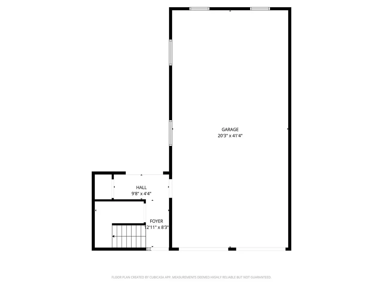 Floor plan of a garage measuring 20'3" x 41'4", with adjacent hall and foyer areas, and stairs leading up.