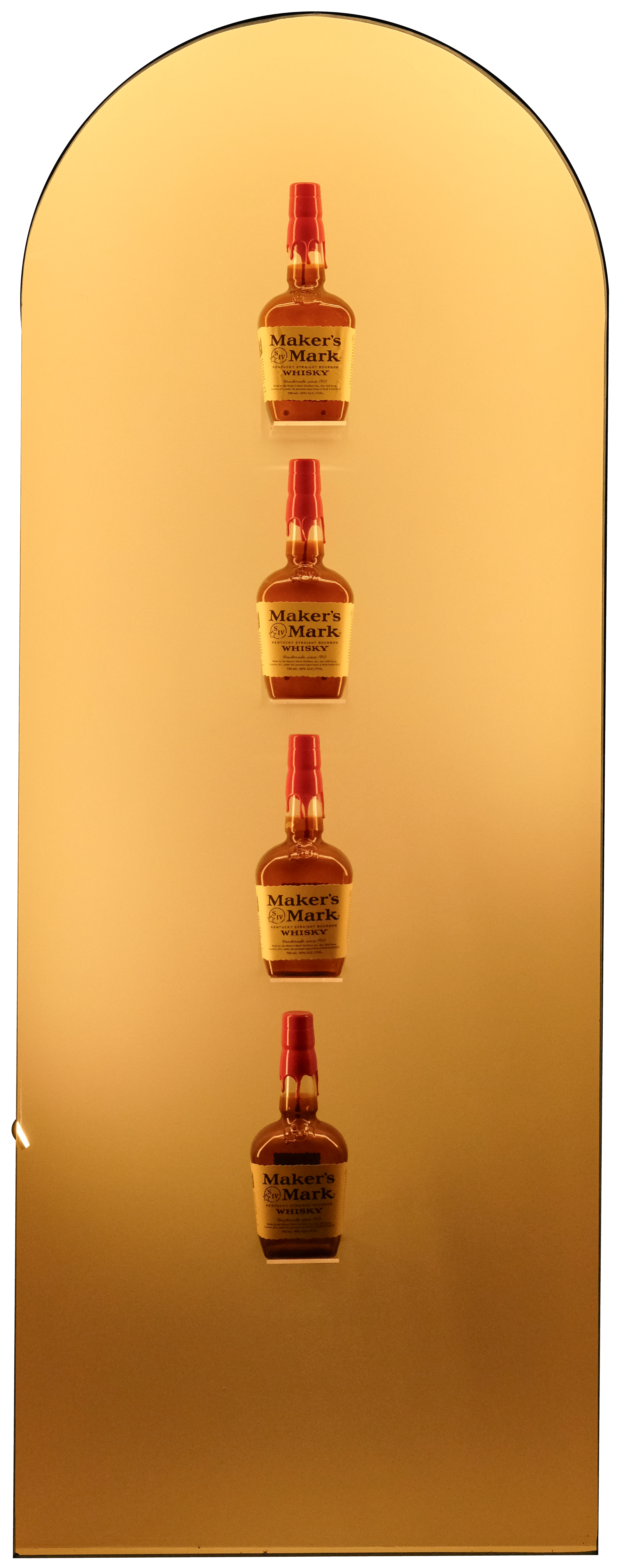 Four bottles of Maker's Mark whiskey arranged vertically on a warm, amber-colored background.