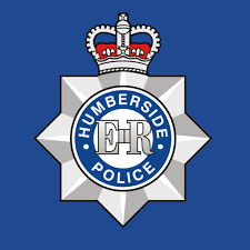 Humberside Police emblem on blue background