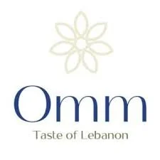 Ommt logo with a stylized flower above the text 'Ommt Taste of Lebanon'