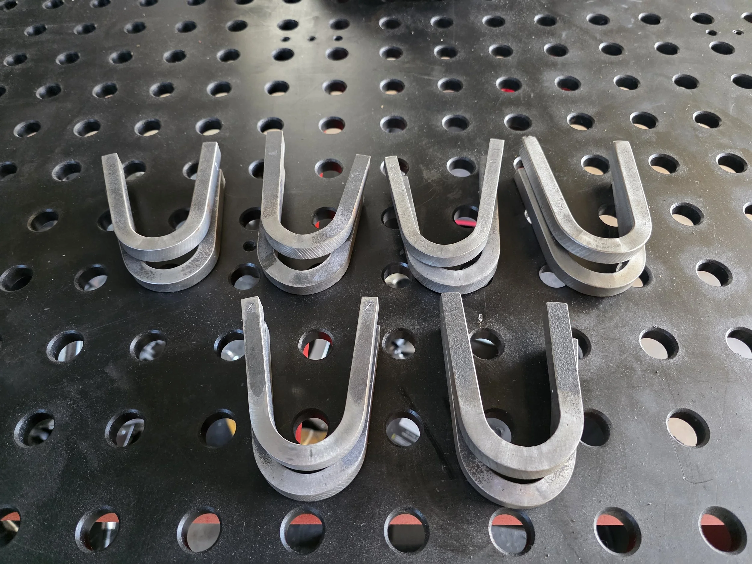 Weld test coupons after bend testing.
