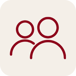 Icon of two simple, stylized people facing forward, likely representing a group or community.