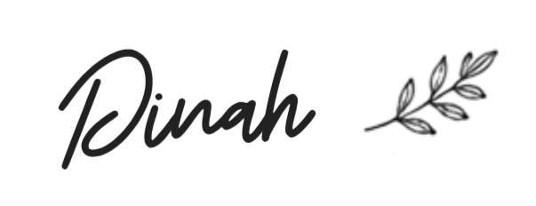 Stylized black script lettering spelling “Dinah” on a black background