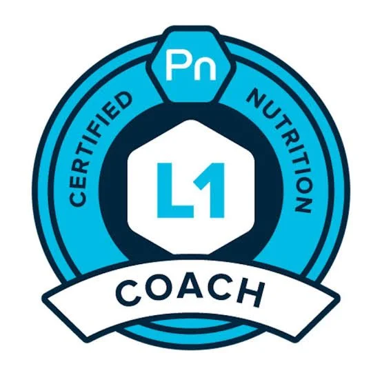Badge with blue and white colors reading "Certified Nutrition Coach" with "L1" in the center and "Coach" on a ribbon at the bottom.