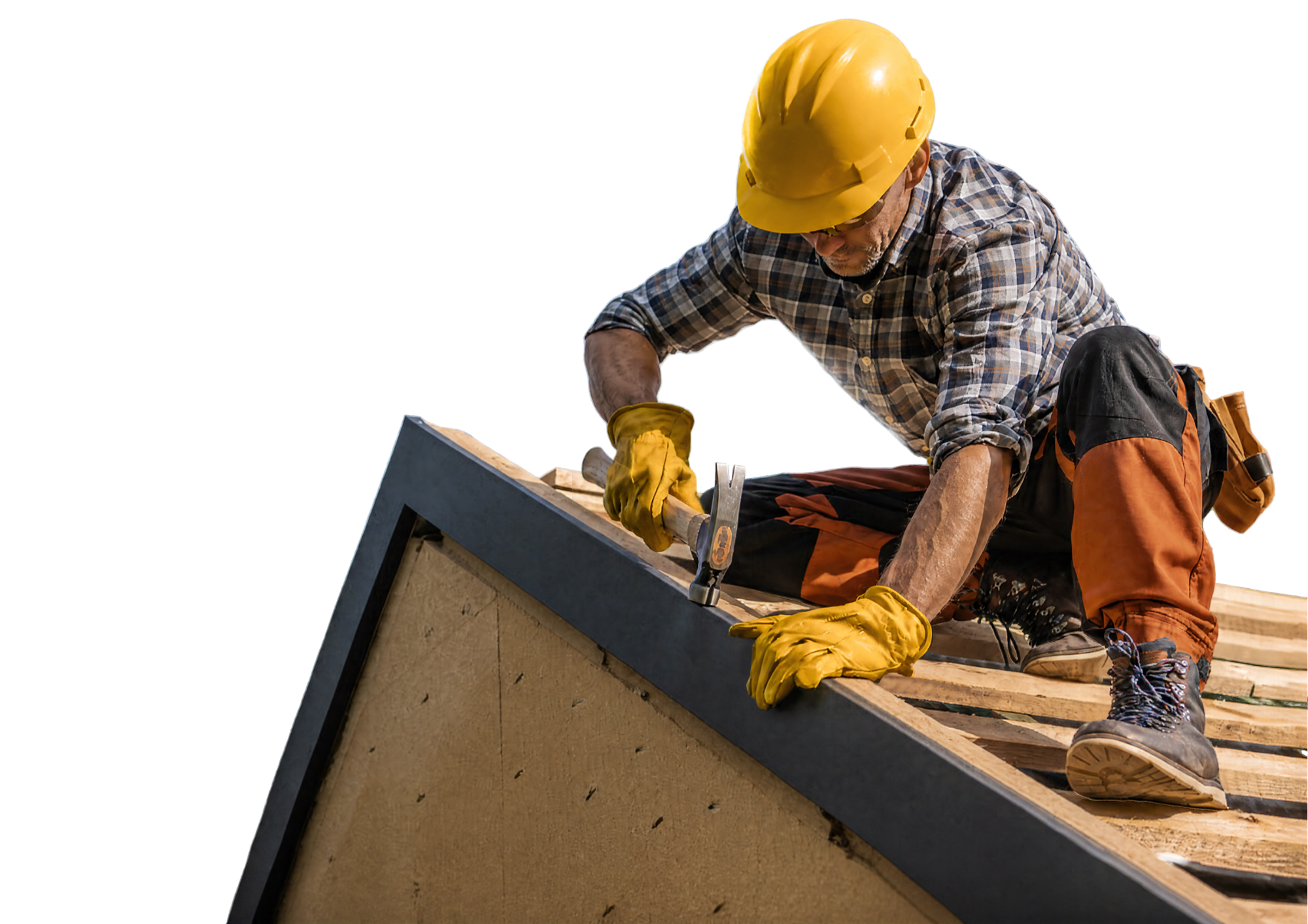 Construction worker in a yellow hard hat and safety gear using a hammer on a rooftop.