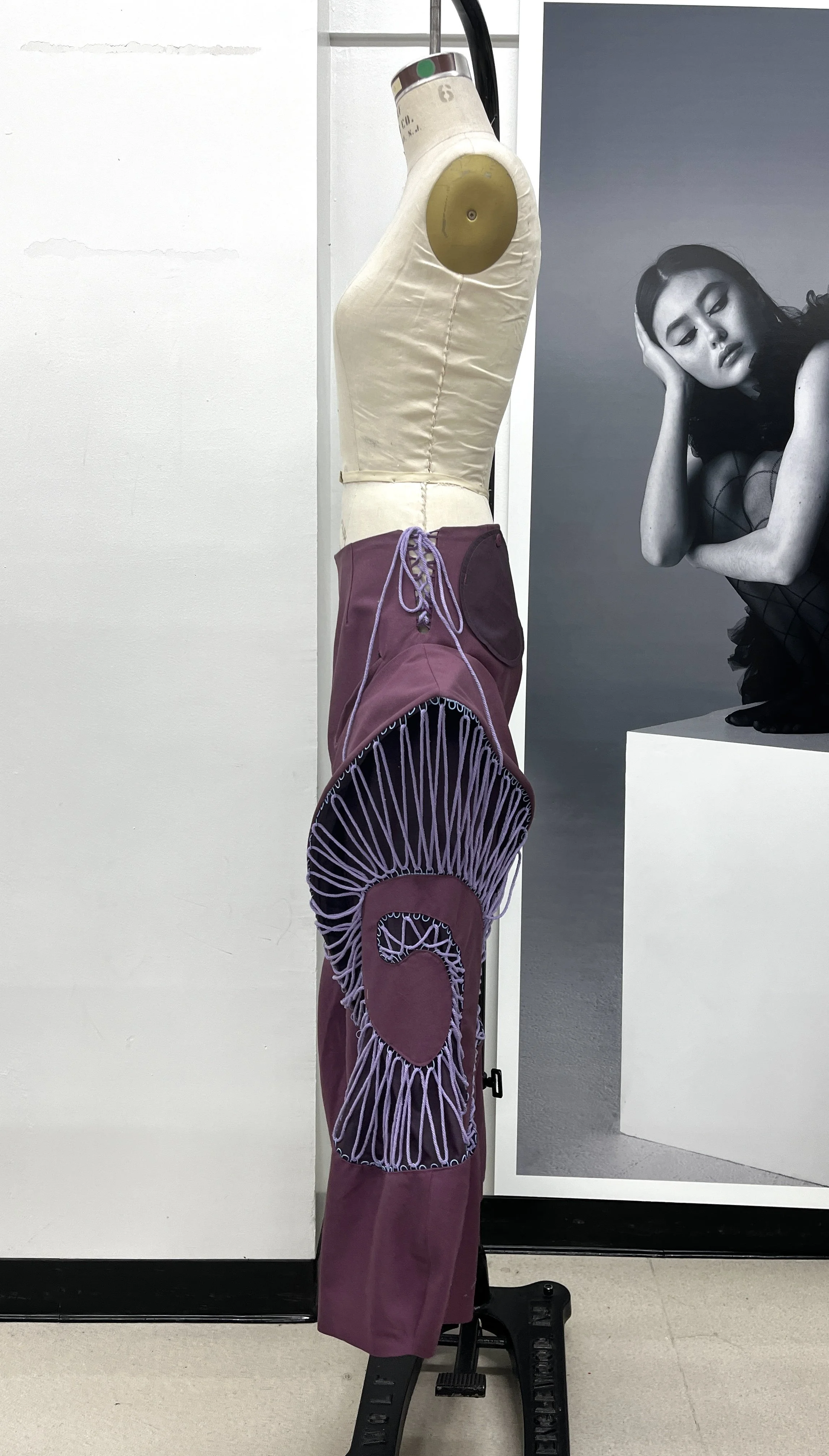 Pants Design Project:
Cotton twill spiral cutout pants with boned hood, lace up, and curved welt pockets. Designed, flat patterned, and constructed in 2025.