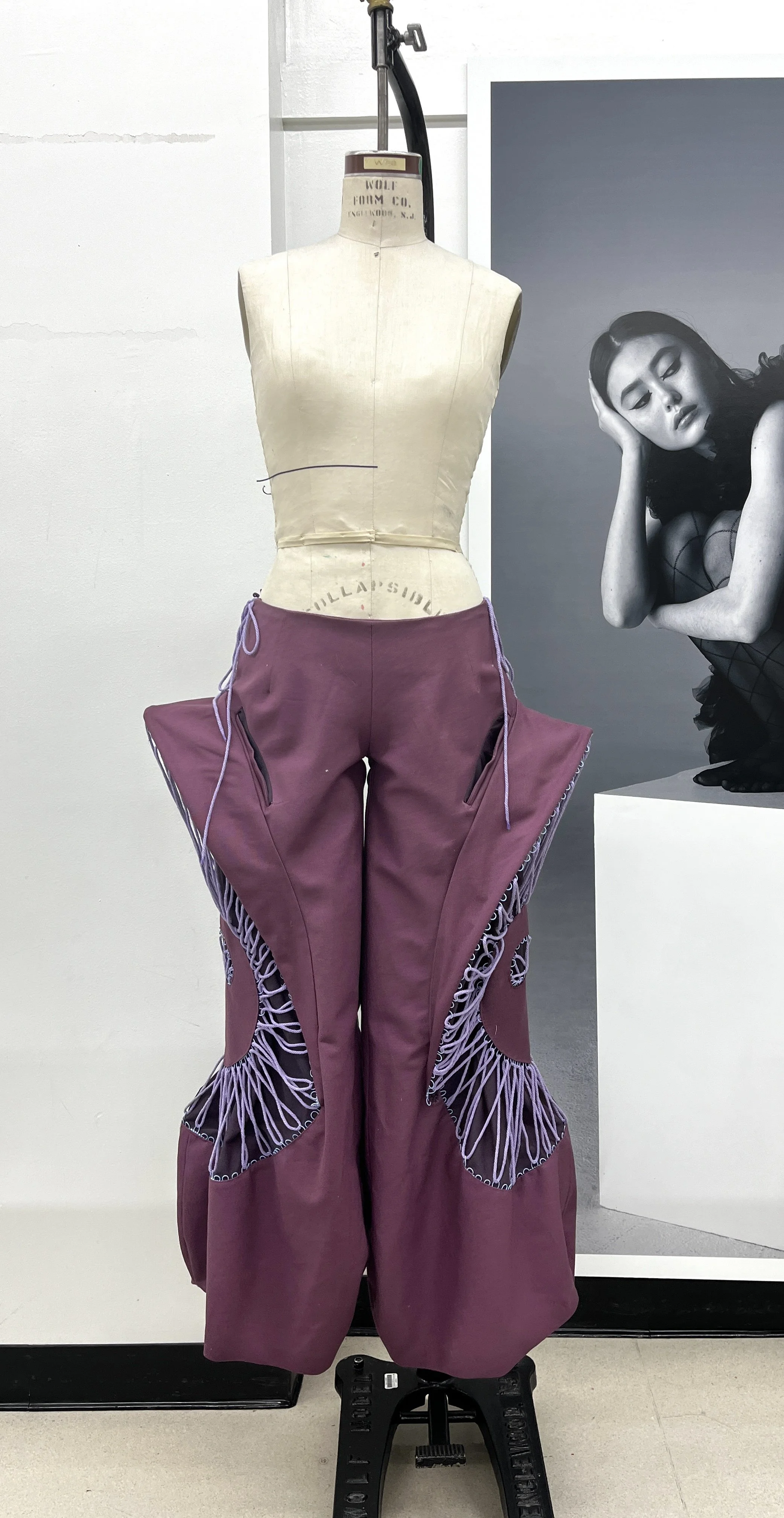 Pants Design Project:
Cotton twill spiral cutout pants with boned hood, lace up, and curved welt pockets. Designed, flat patterned, and constructed in 2025.