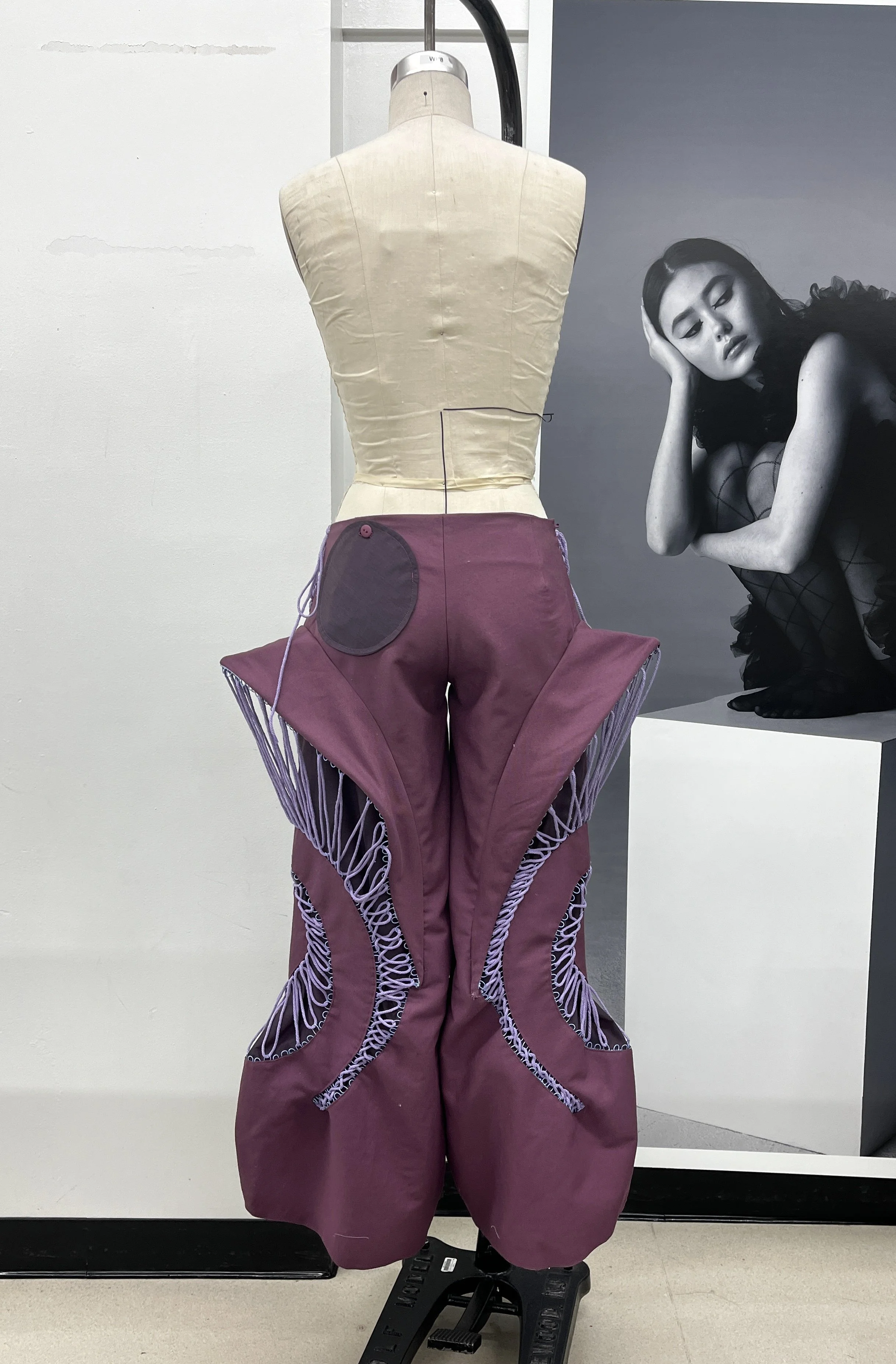 Pants Design Project:
Cotton twill spiral cutout pants with boned hood, lace up, and curved welt pockets. Designed, flat patterned, and constructed in 2025.