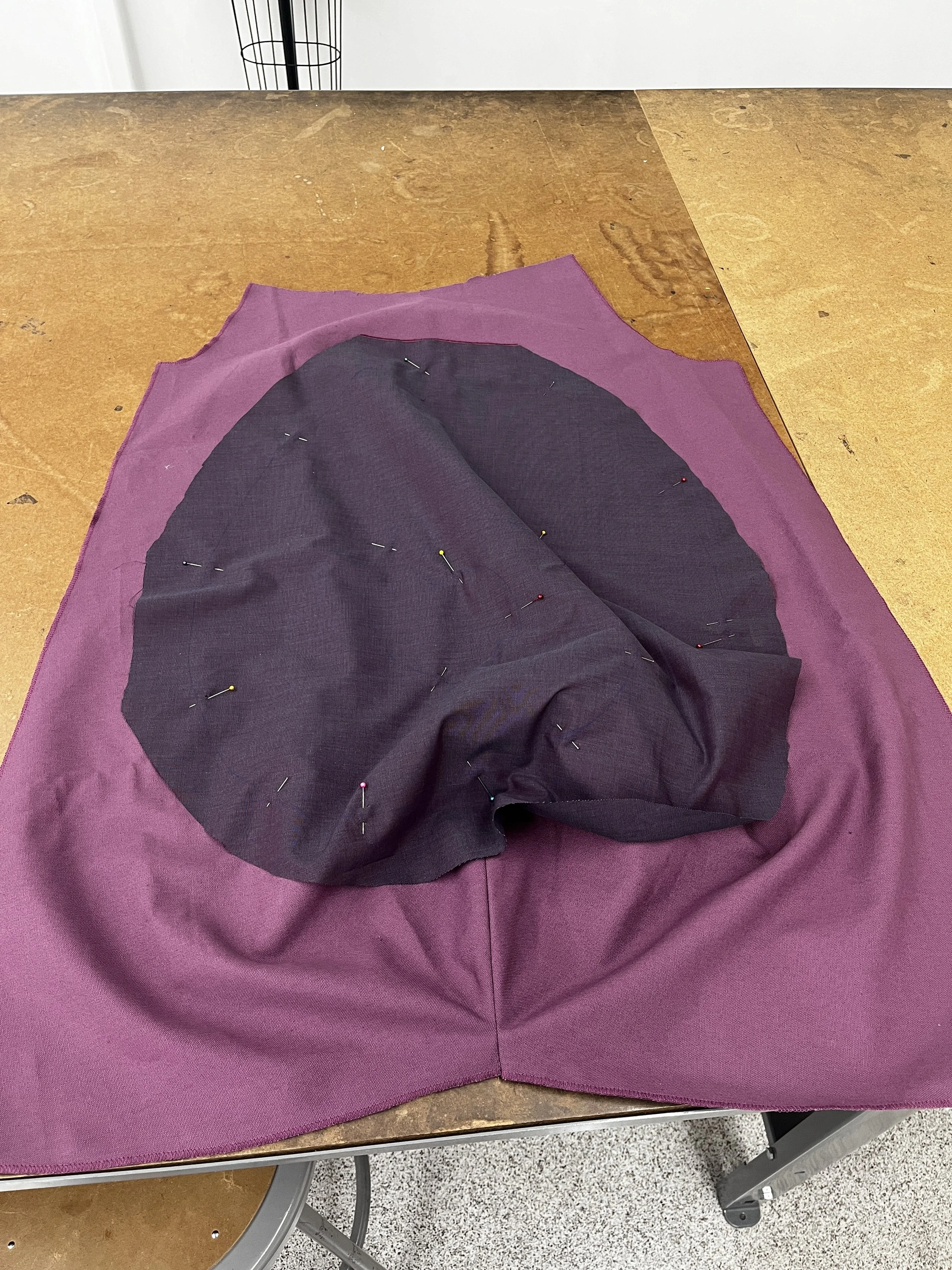 Pants Design Project:
Cotton twill spiral cutout pants with boned hood, lace up, and curved welt pockets. Designed, flat patterned, and constructed in 2025.