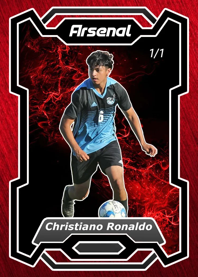 A soccer trading card featuring a young boy in a blue and black soccer uniform kicking a soccer ball, with a red and black fiery background, labeled 'Arsenal' and 'Christiano Ronaldo'.