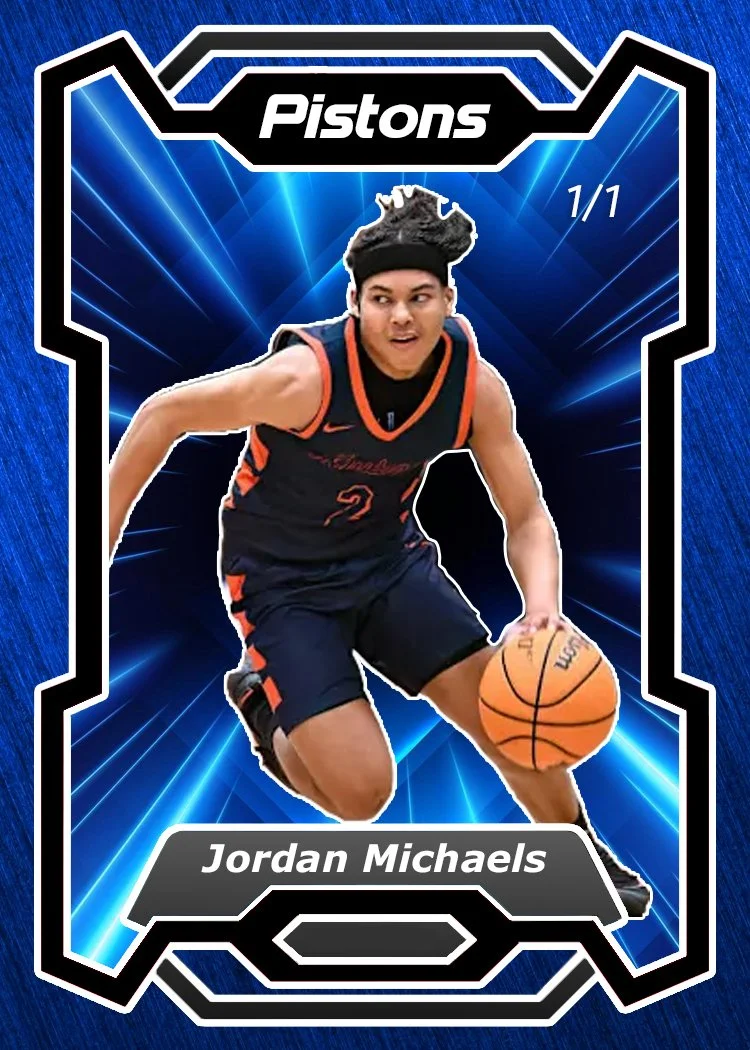 Basketball trading card featuring Jordan Michaels in a black and orange uniform, dribbling a basketball against a blue background with dynamic lines, with 'Pistons' at the top and his name at the bottom.