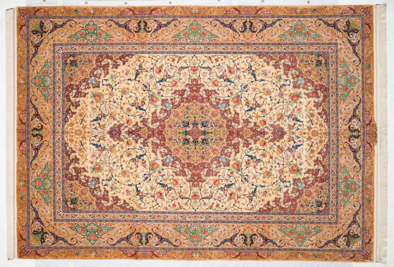 No. 09 · Ivory and peach field, red medallion