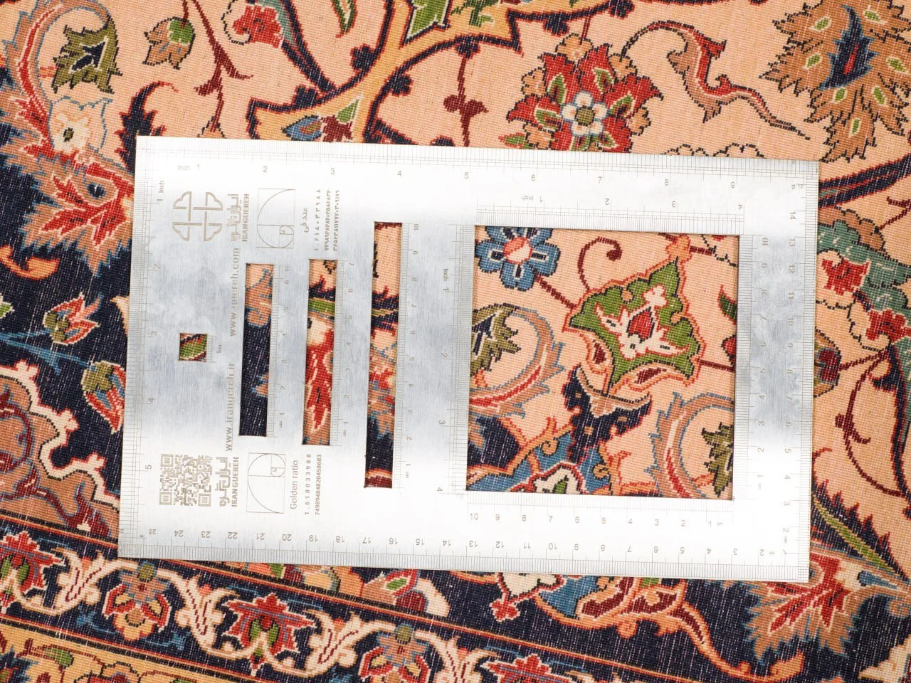 Knot-count gauge on a hand-knotted Isfahan carpet