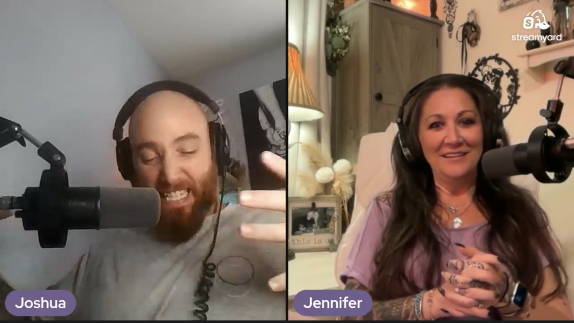 Split-screen video call with two people, Joshua on the left with a microphone, beard, and headphones, gesturing with his hand; Jennifer on the right with long dark hair, tattoos, and a headset, sitting in a cozy room with warm lighting and decorative wall hangings.