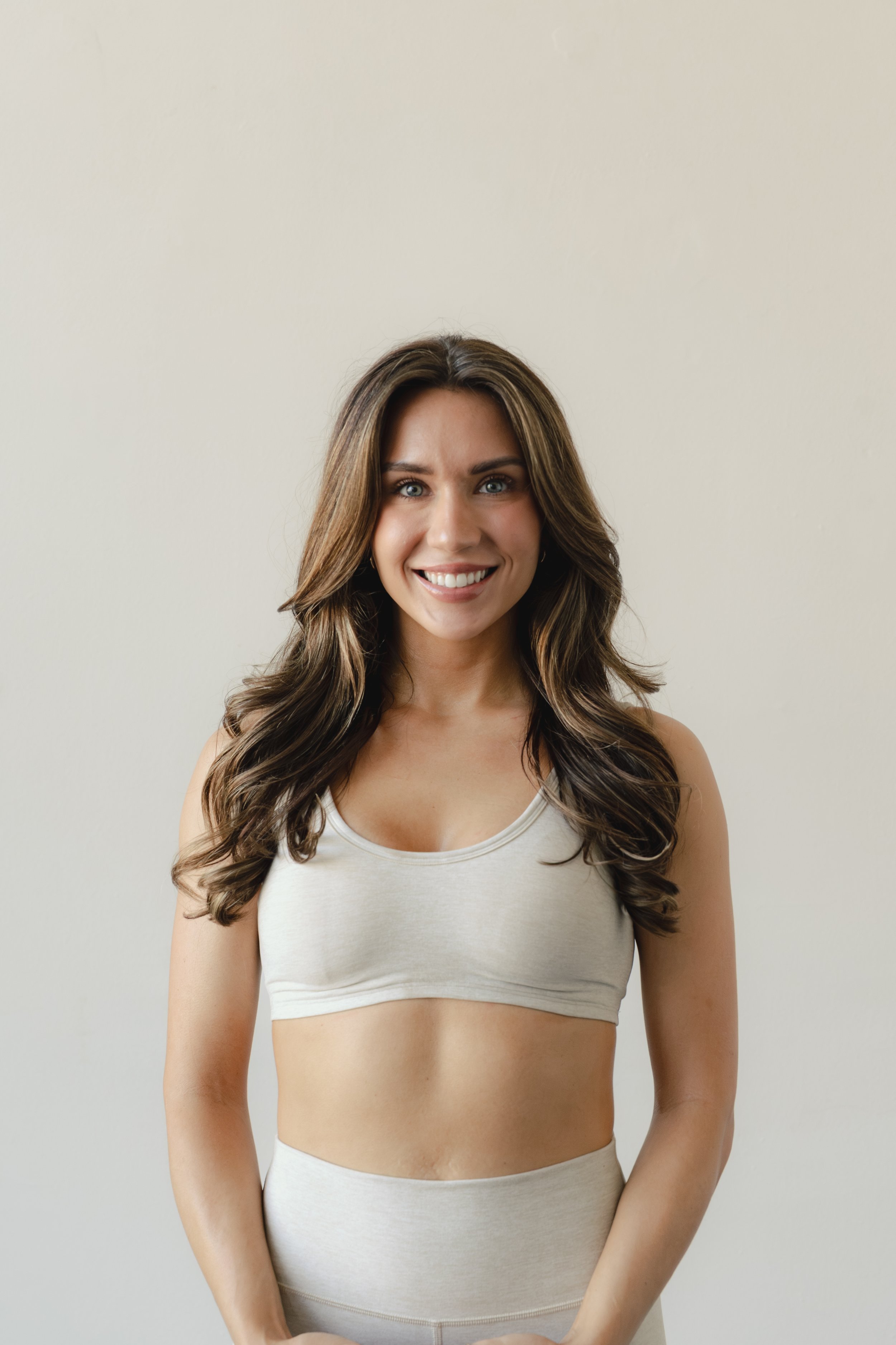 Audri Harrell, certified personal trainer, Pilates instructor, yoga, strength trainer, and founder of Harlé.