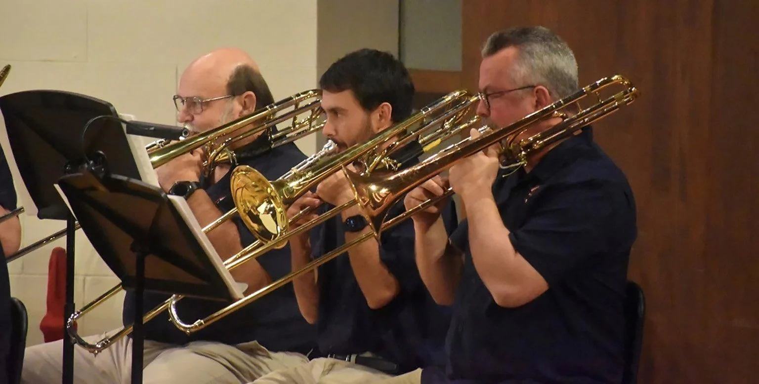 The trombone section of the Roman Festival Brass Band practicing for an upcoming concert at Shorter University in Rome GA