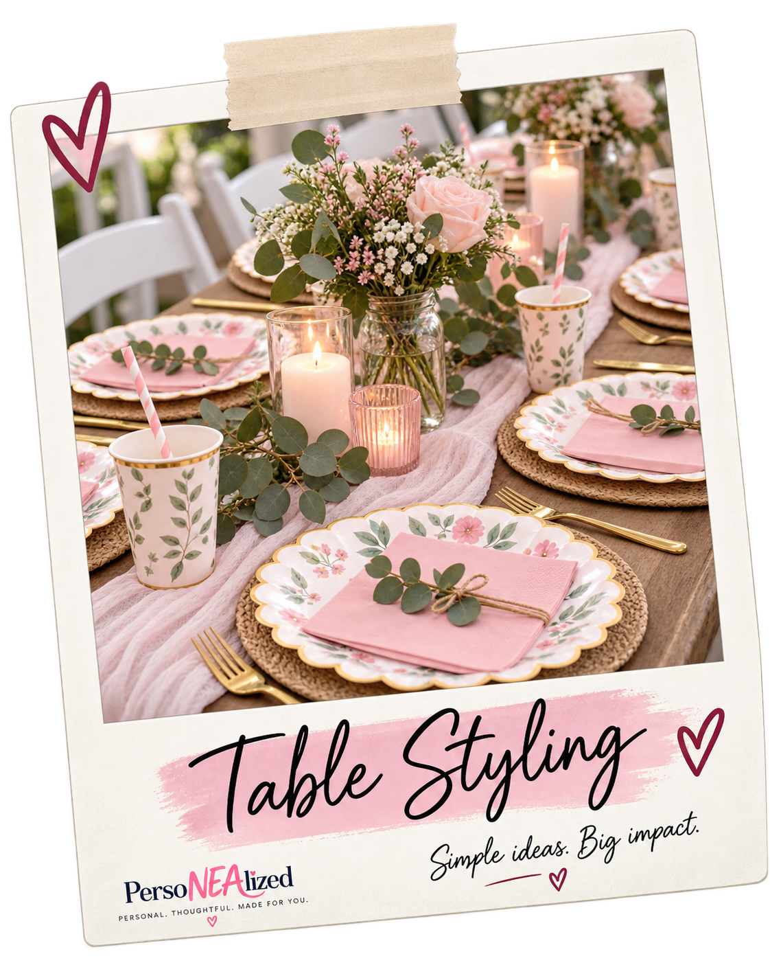 Decorative outdoor table setting with pink floral plates, pink napkins tied with greenery, gold utensils, candlelight, and a pink theme with candles and floral arrangements.
