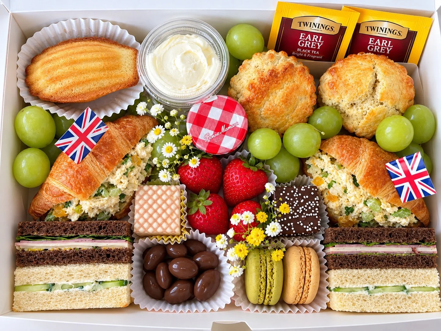 Orlando Scone Co. Afternoon Tea Box for two with scones, clotted cream, jam, croissant and finger sandwiches, strawberries, grapes, macarons, sweets and Earl Grey tea
