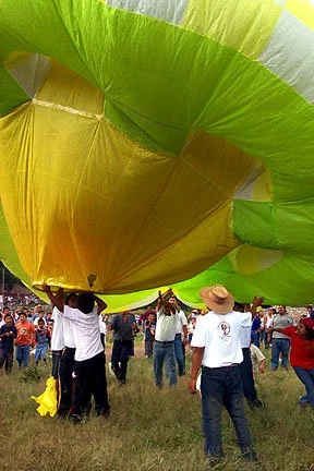 launching Chinese-paper balloons