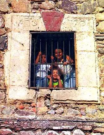 children in the bell tower - Ajijic's Paraoquia