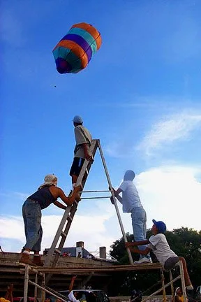 launching home made Chinese-paper balloons