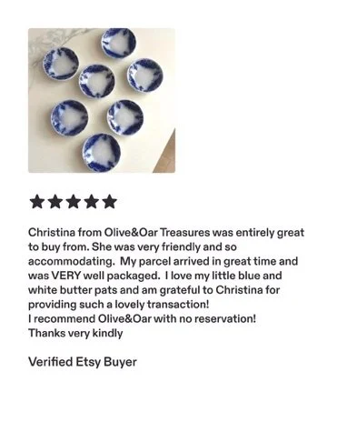Seven small blue and white ceramic bowls arranged in a circle on a light-colored surface.