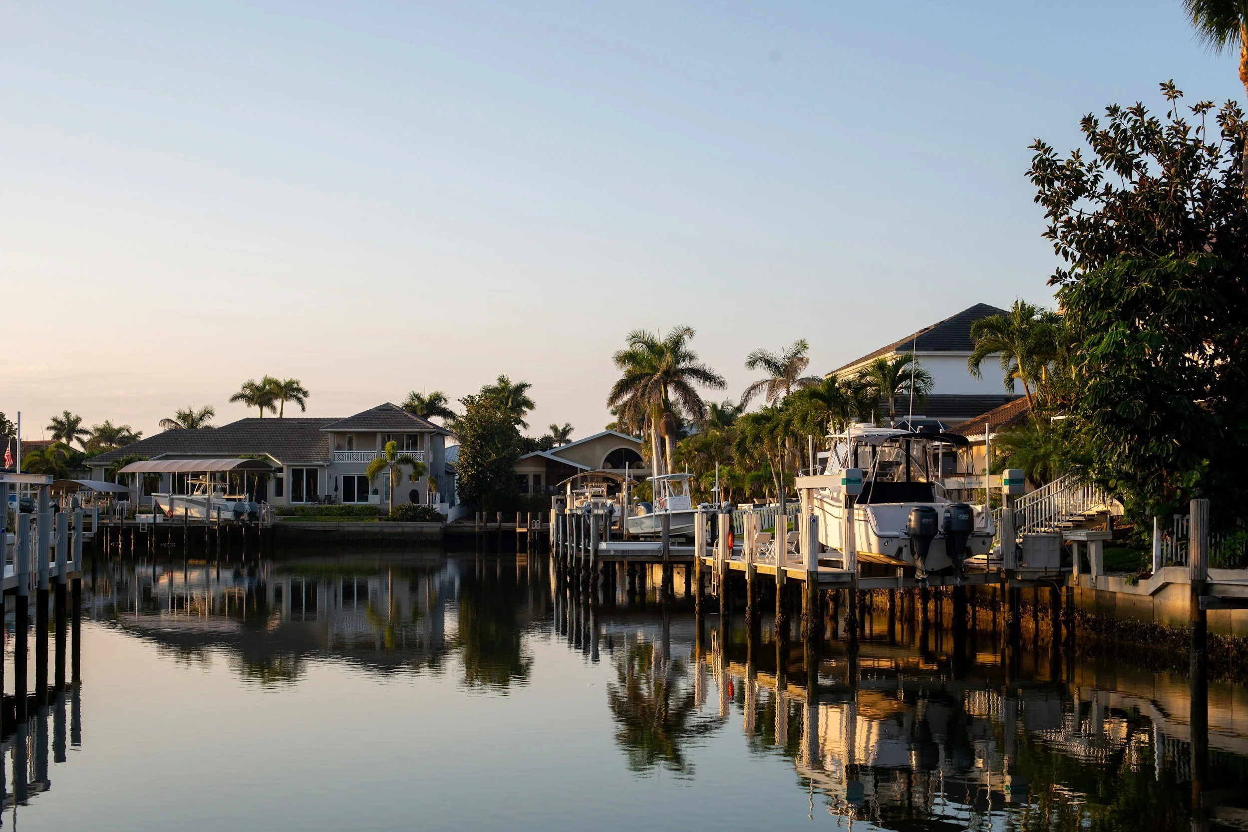 Waterfront homes and palm trees along Florida’s Gulf Coast.