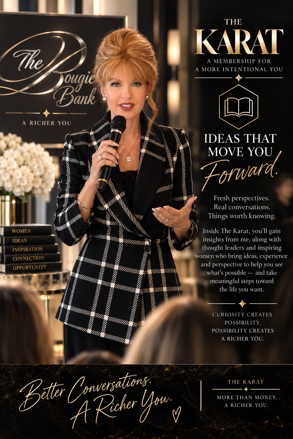 A woman speaking into a microphone at a promotional event for The Karat, a membership program. She is wearing a black and white plaid blazer and has red hair. There are promotional banners in the background with text about The Bougie Bank and The Karat.