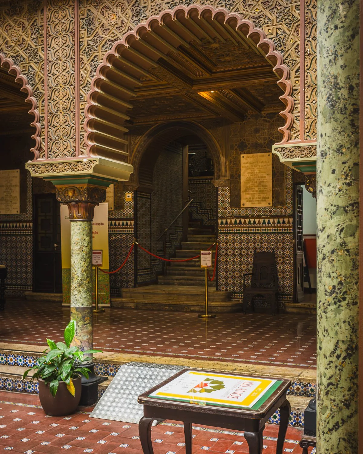 Neo-Moorish arches, tiled walls and a staircase in the courtyard of the Casa do Alentejo, Lisbon