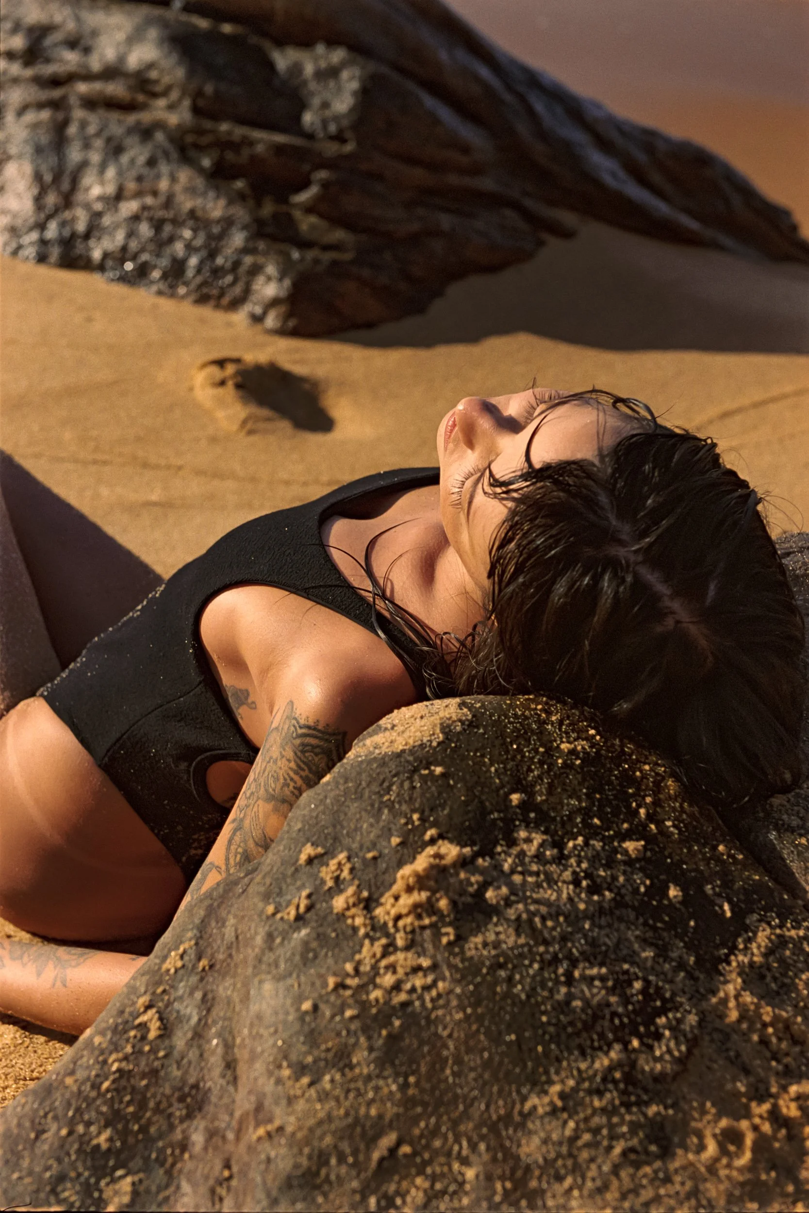 Reclining on warm rock in a Clio black swimsuit, 35mm film