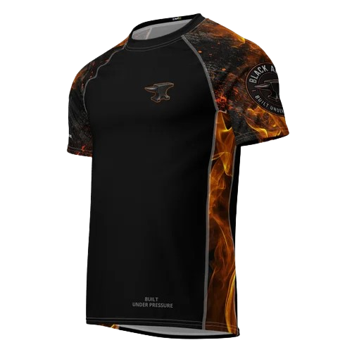 Black sports jersey with fiery orange and yellow flames on the sleeves and side, a small logo on the chest, and a circular patch on the sleeve reading 'Black Anvil Built Under Pressure.'