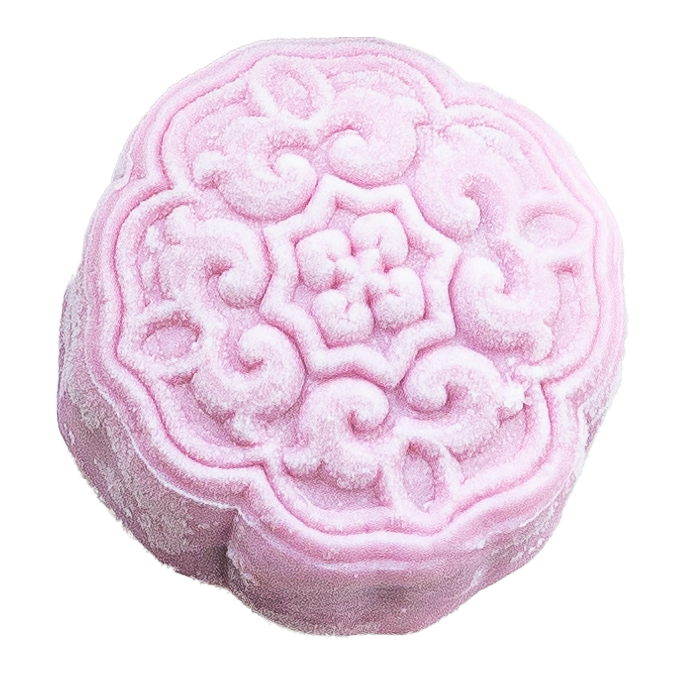 A pink mooncake with intricate floral and geometric patterns on top.