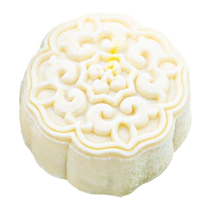 A white, round Chinese snow fungus with intricate carvings on top.