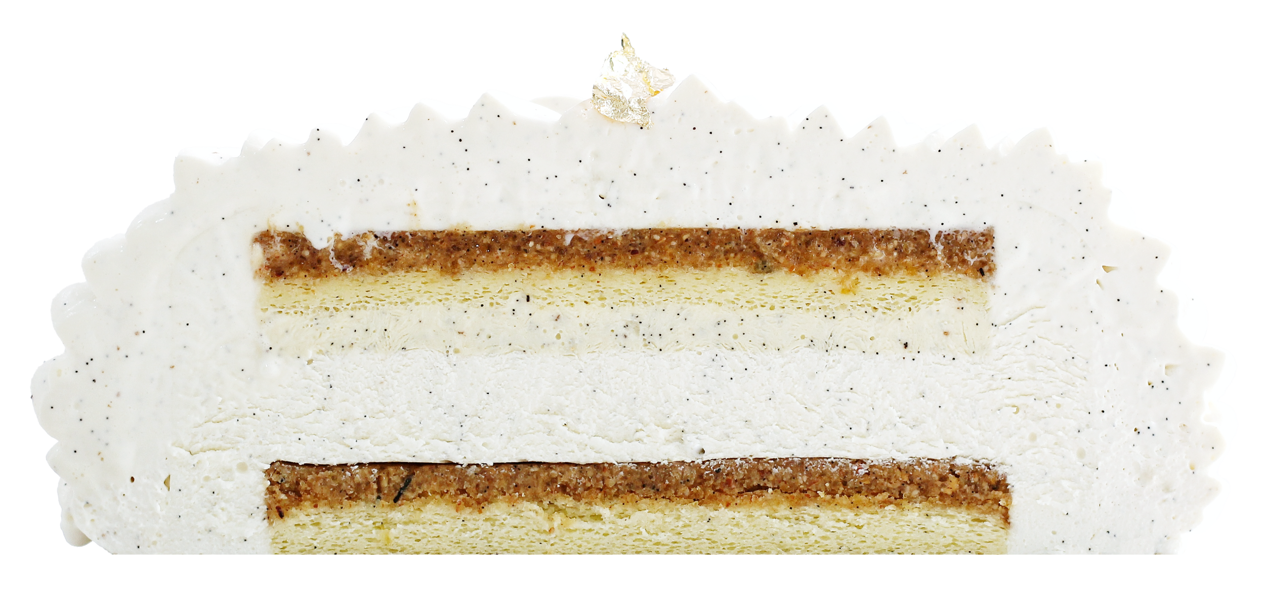 A close-up of a sliced layered cake with white frosting, speckled with black, with alternating layers of whipped cream, cake, and possibly caramel or nut filling.
