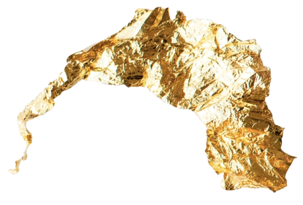 Gold-colored rock formation with a jagged, mountainous appearance.