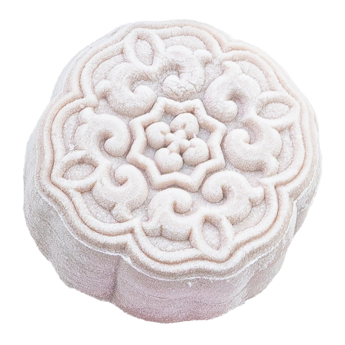 A white moon cake with intricate, traditional Chinese patterns on its top surface.