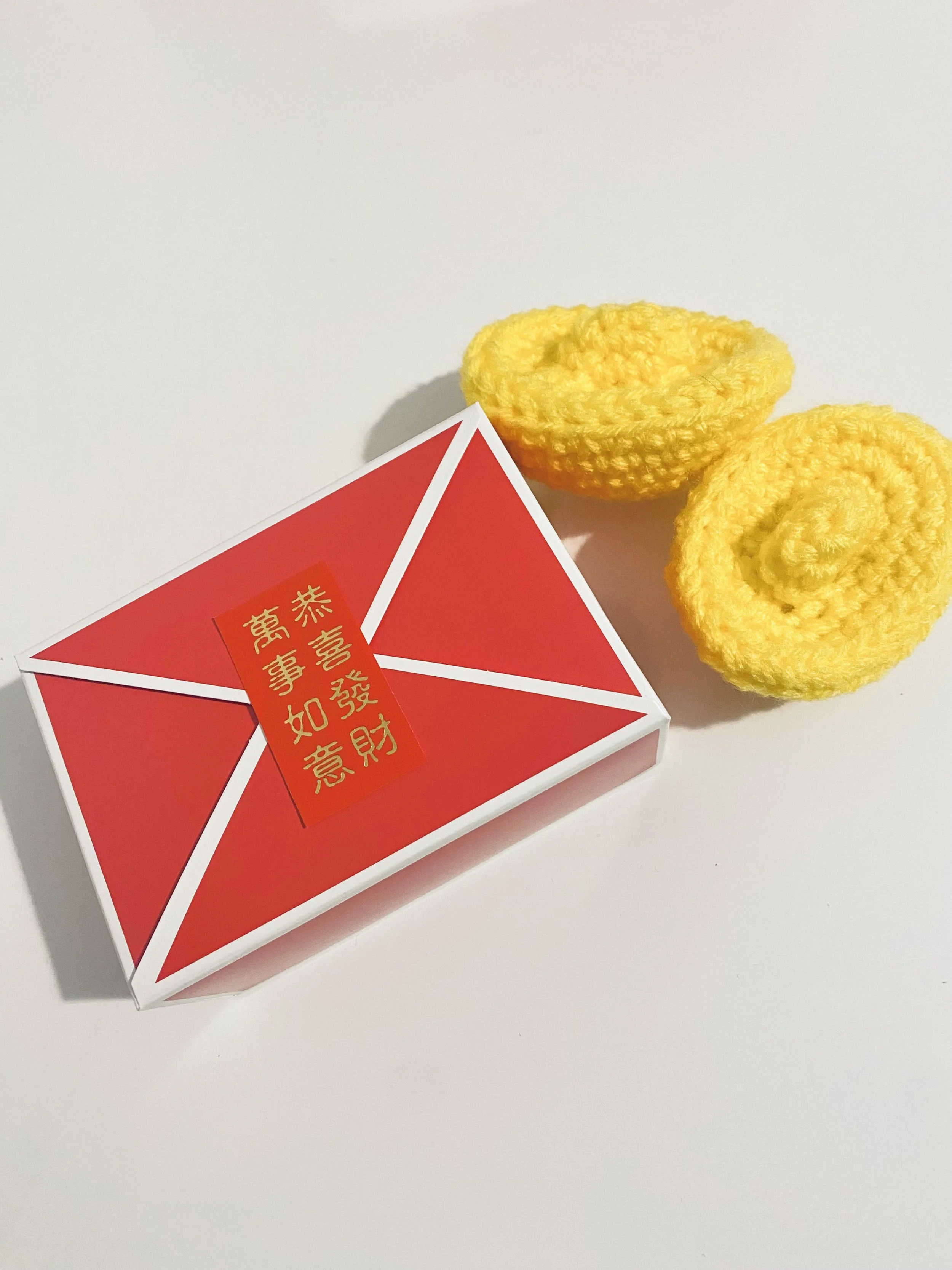 crochet Chinese golden nuggets with a red box