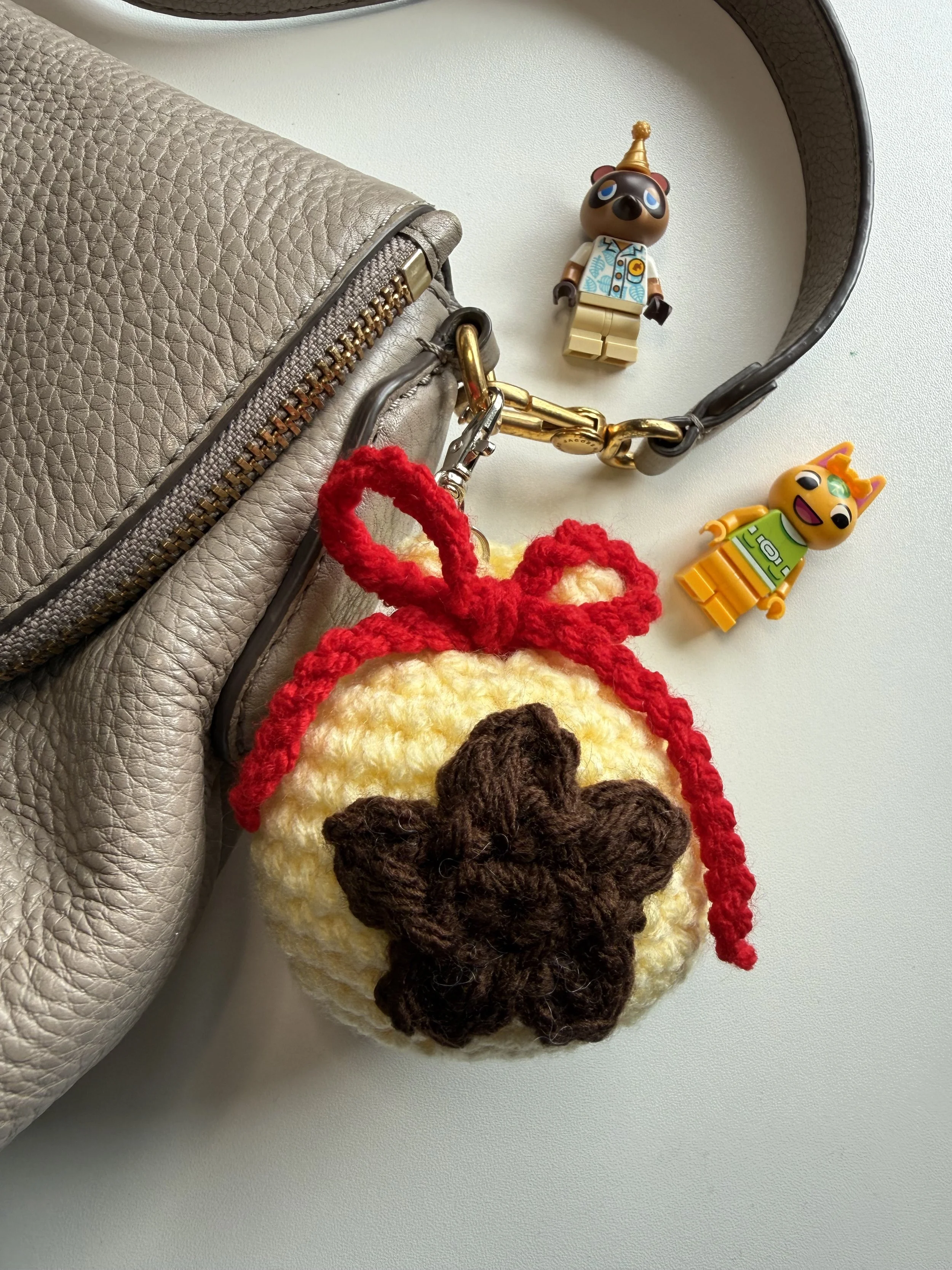 Crochet Animal Crossing money bag with tan purse