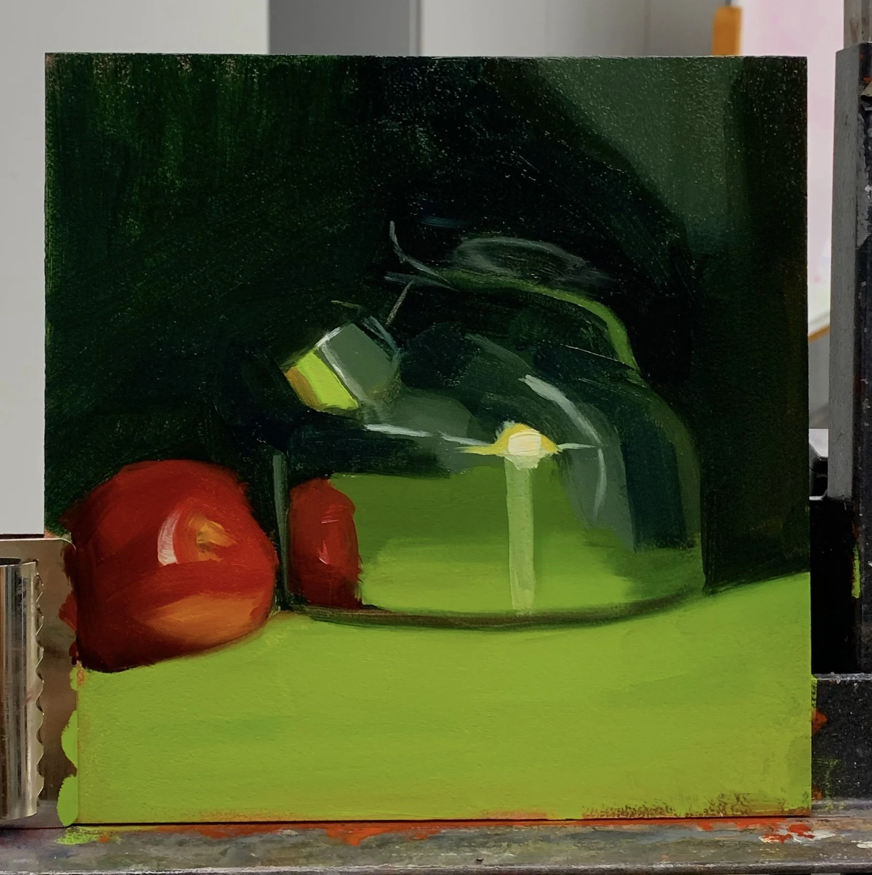 A colorful abstract painting featuring large red circles in the lower left corner, yellow and gray shapes in the middle, and a dark green, black, and green background with expressive brushstrokes.