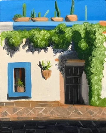 A colorful outdoor scene with a white building, a window with a plant inside, a hanging pot with plants, a black door, and lush green foliage covering part of the building. Blue sky and cacti are in the background.