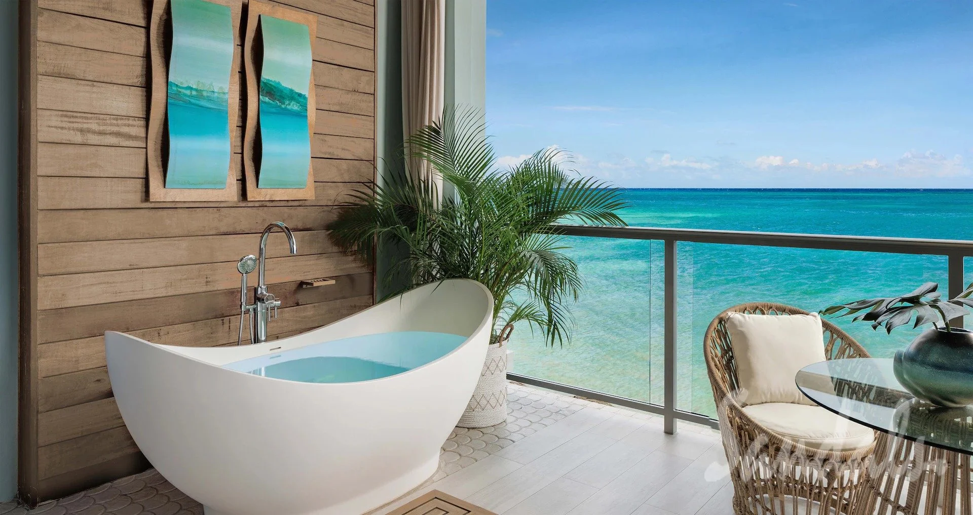 Sandals room with soaking tub for two on balcony overlooking the ocean