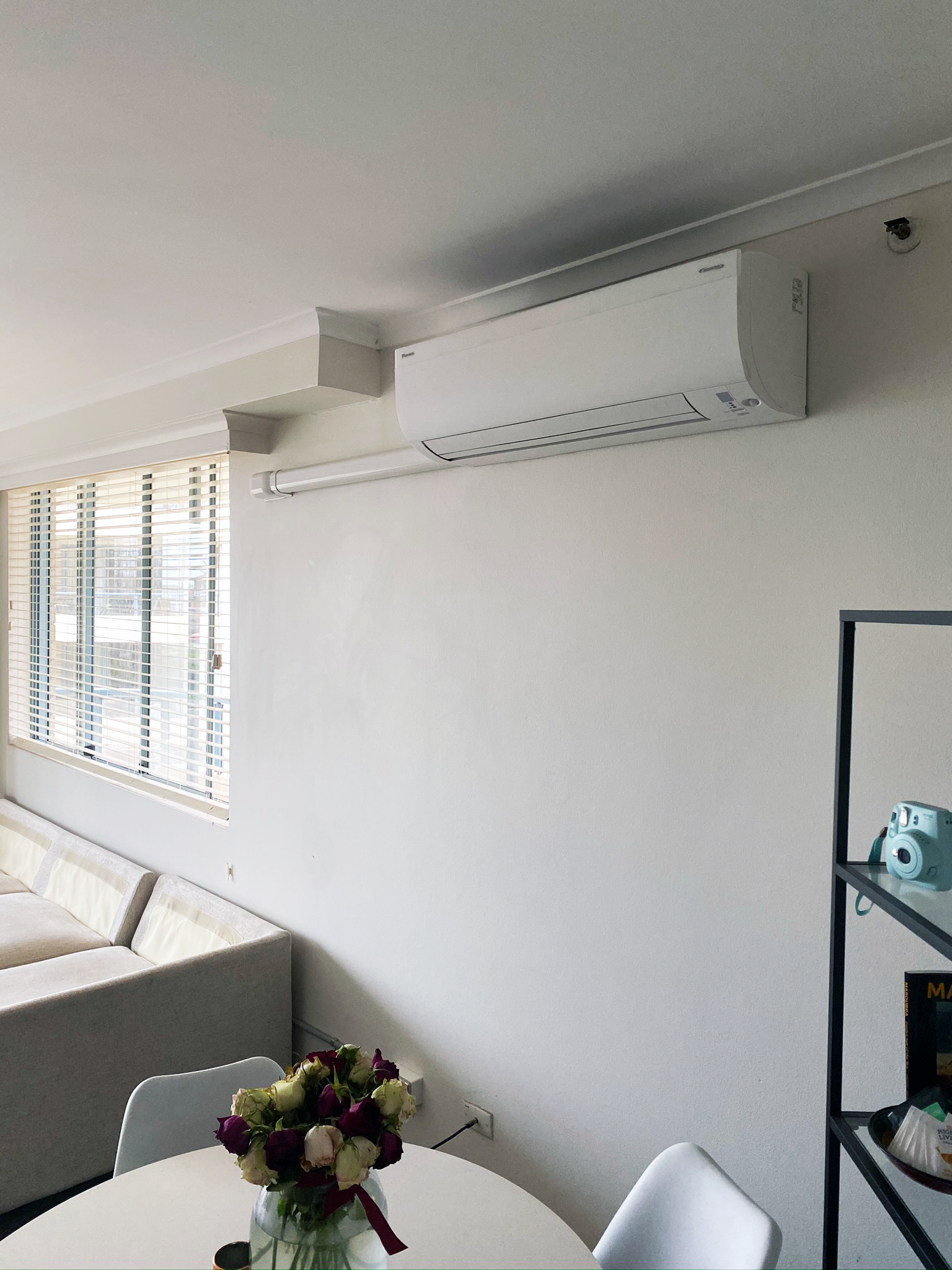 Wall-mounted split system in a living room
